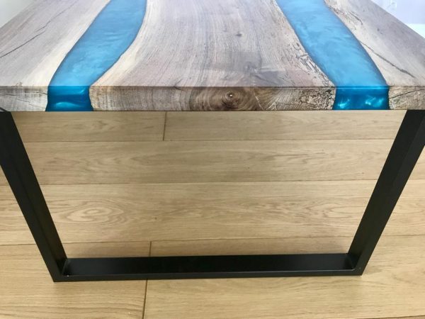Epoxy River Table Made of Walnut Wood