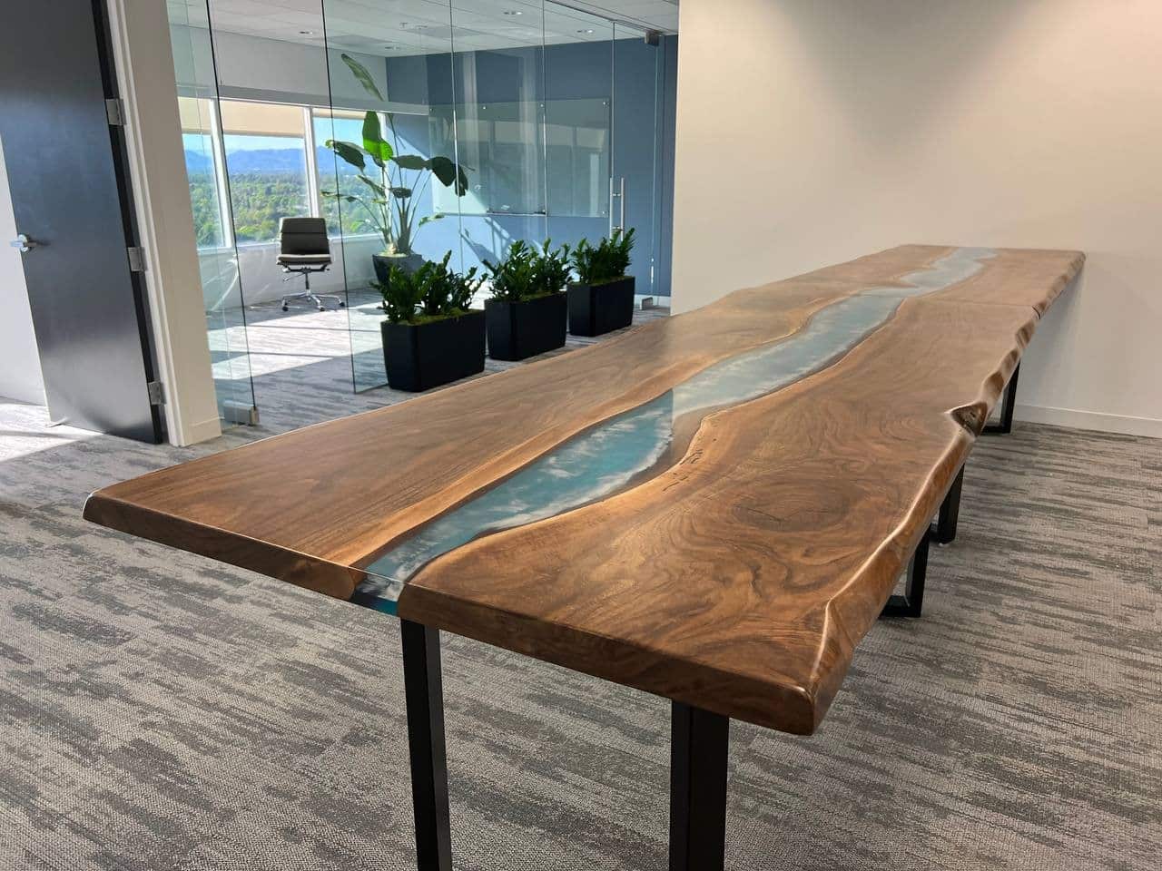 https://maxiwoods.com/wp-content/uploads/2022/08/Live-Edge-Black-Walnut-blue-epoxy-river-table-with-waves.jpg